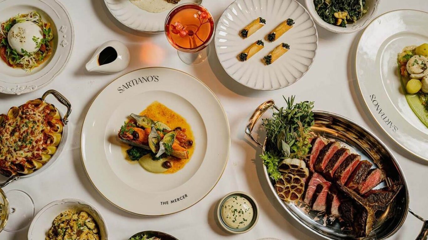spread of Italian classics from Sartiano's on a dining table