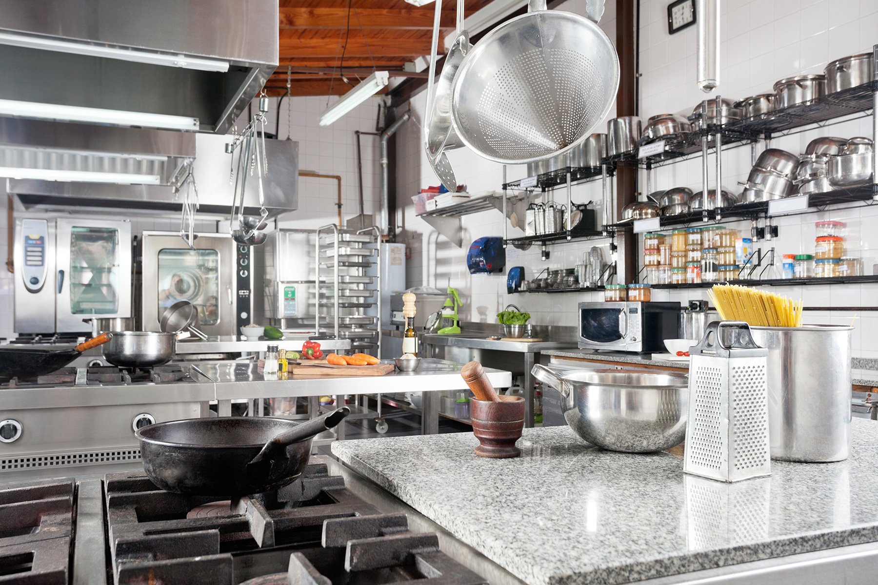 Utensils On Counter In Commercial Kitchen