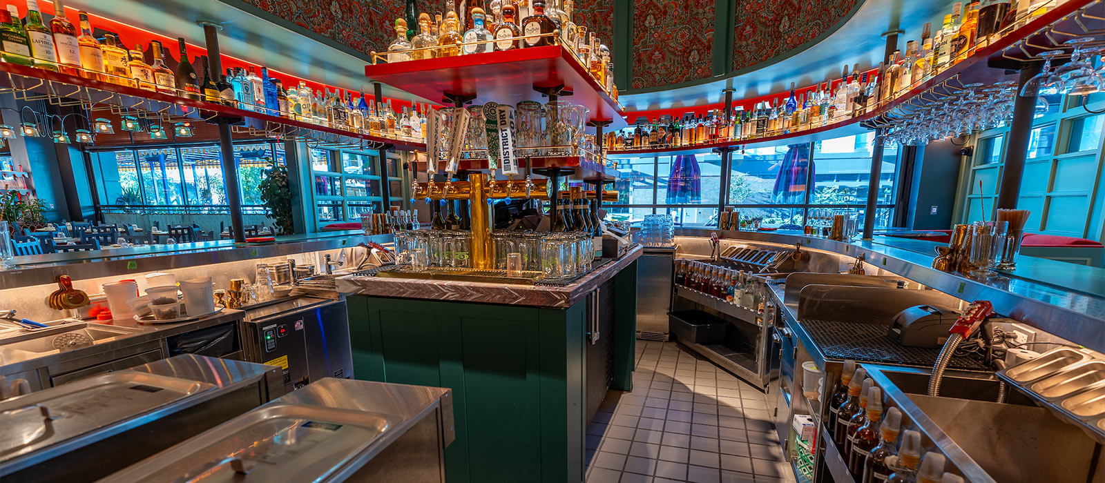 El Presidente kitchen bar with drink bottles and sink