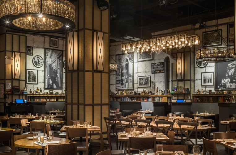 Dimly lit dining room of The Ribbon restaurant