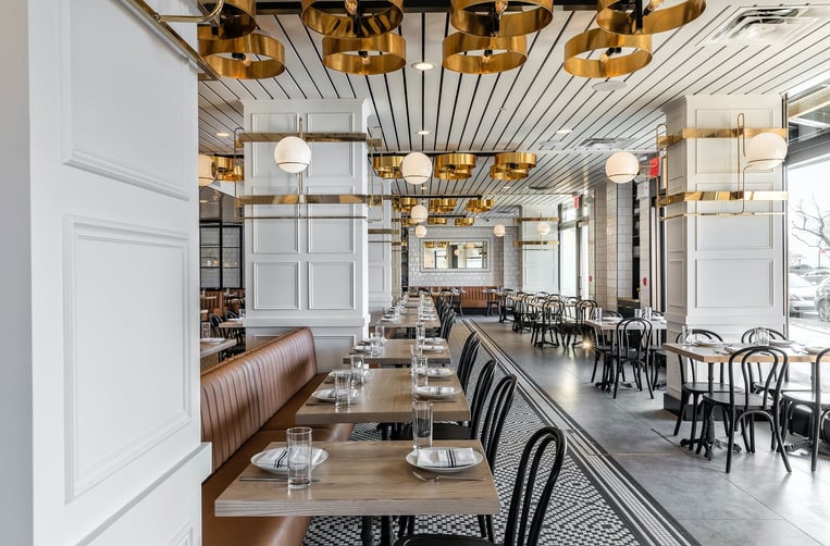 A crisp and sunny shot of the American Brass restaurant dining room