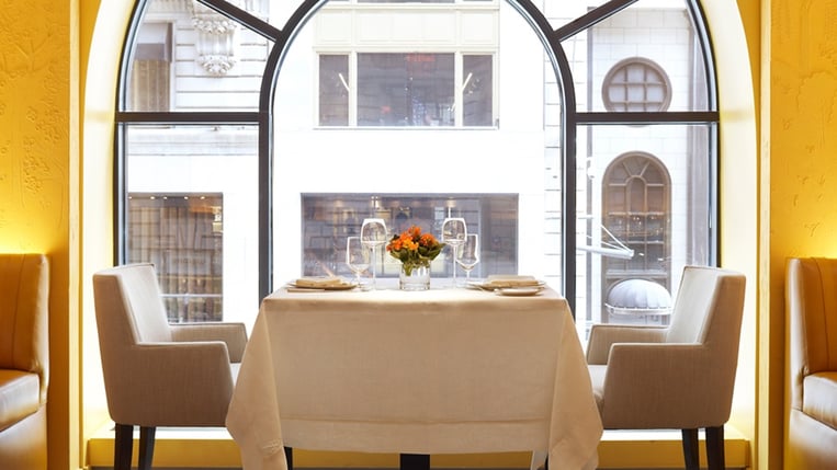 Clement restaurant window view of 2 person place setting