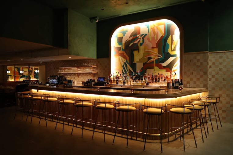 Little Maven interior bar with dimly lit setting