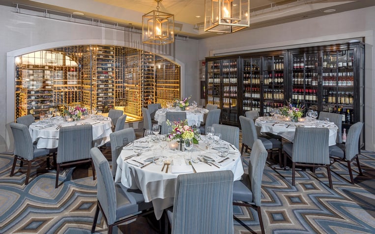 Prime Huntington private event area with grey color scheme and fine dining aesthetic
