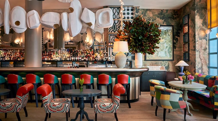 Warren Street Bar & Restaurant interior with colorful bar and interior decor
