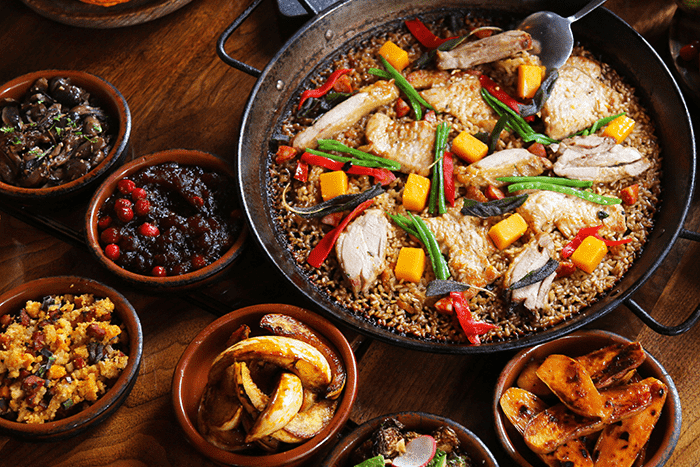 spanish inspired thanksgiving dishes including paella, butternut squash, and more