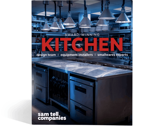 Modern stainless steel restaurant kitchen with text Kitchen