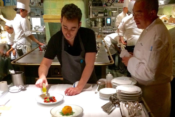 Le Coucou Chef cutting into meal